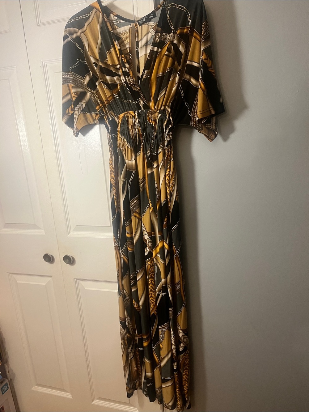 Elegant Black and Gold Chain-Print Maxi Dress with Smocked Waist